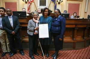 Senator Locke with Dr. Gladys West and her daughter.